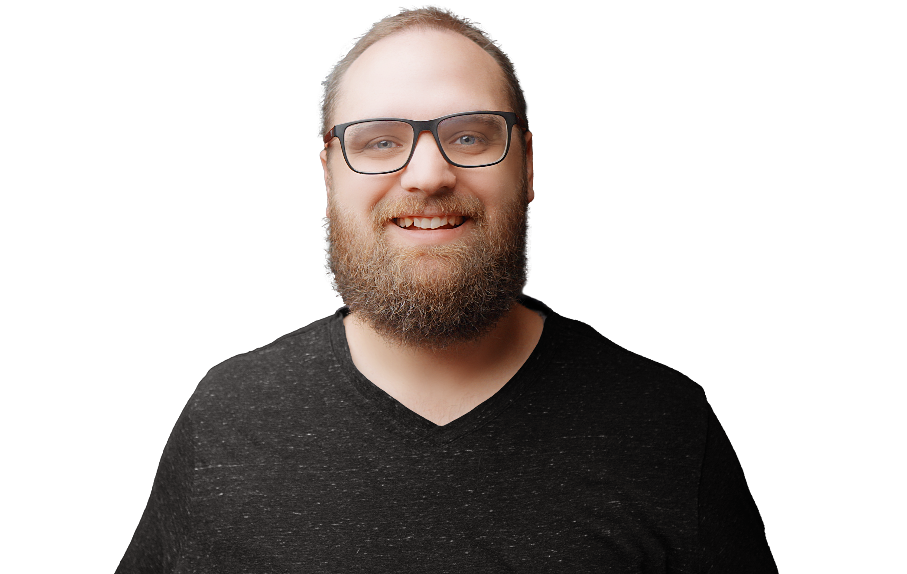 Andrew Farmer smiling, wearing glasses and a dark shirt